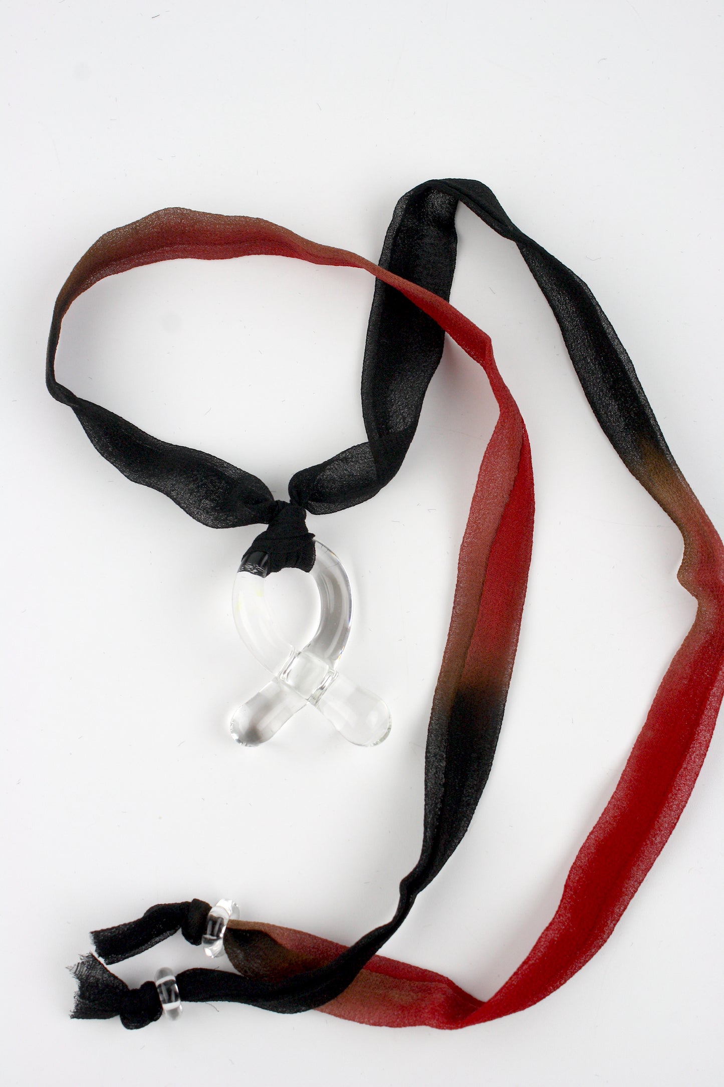 Knotty Pendant - Clear Glass on Red to Black Fade Silk Ribbon